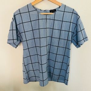 Roolee top! Soft, light blue material with cute buttons down the back.